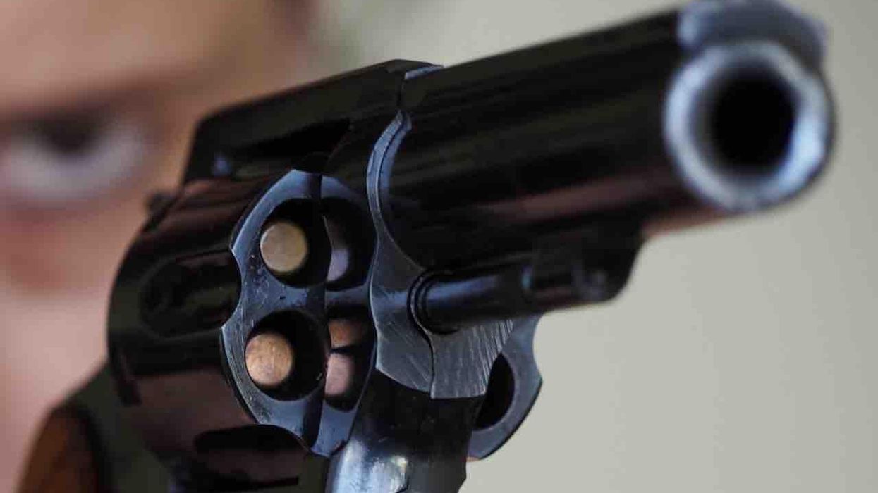 Wife fatally shoots intoxicated man who was fighting her husband outside couple's front door and trying to force his way into home. She got gun the day before.