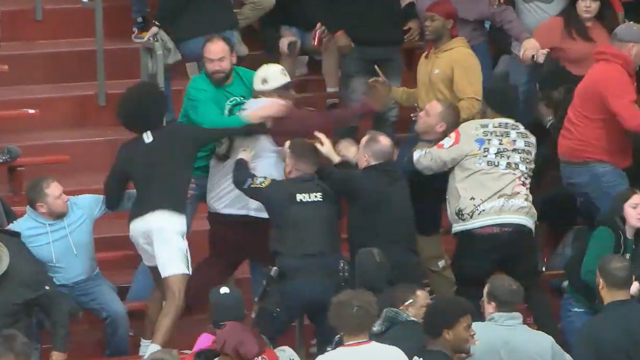 Wild brawl caught on video at HS basketball playoff game; 7 arrested, including 3 minors and 1 player