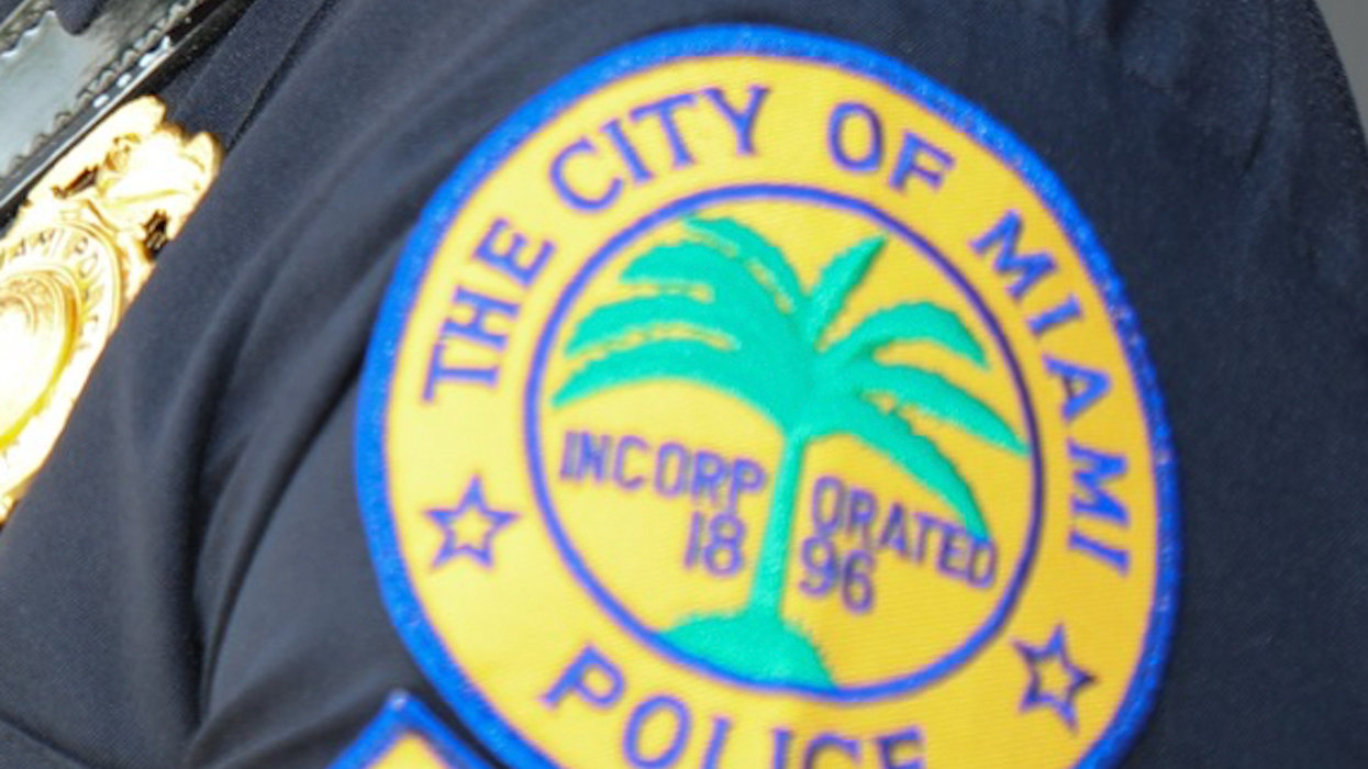 Wild video: Florida cop clings to hood of moving car, shoots through windshield on busy downtown street in broad daylight