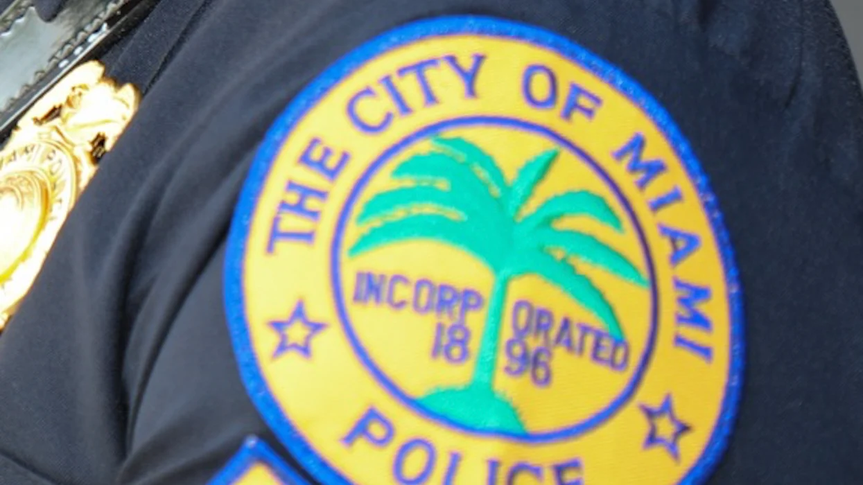 Wild video: Florida cop clings to hood of moving car, shoots through windshield on busy downtown street in broad daylight