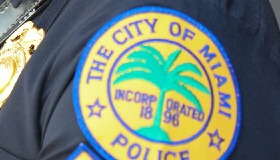 Wild video: Florida cop clings to hood of moving car, shoots through windshield on busy downtown street in broad daylight
