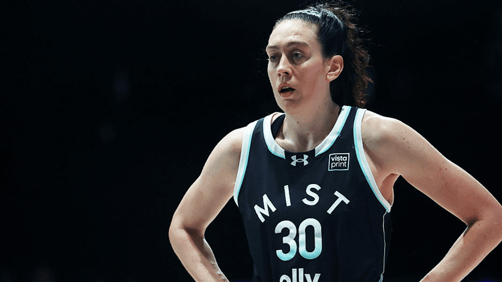 WNBA star holds 'Abolish ICE' sign before game in Florida: 'Everyone here is feeling that way'