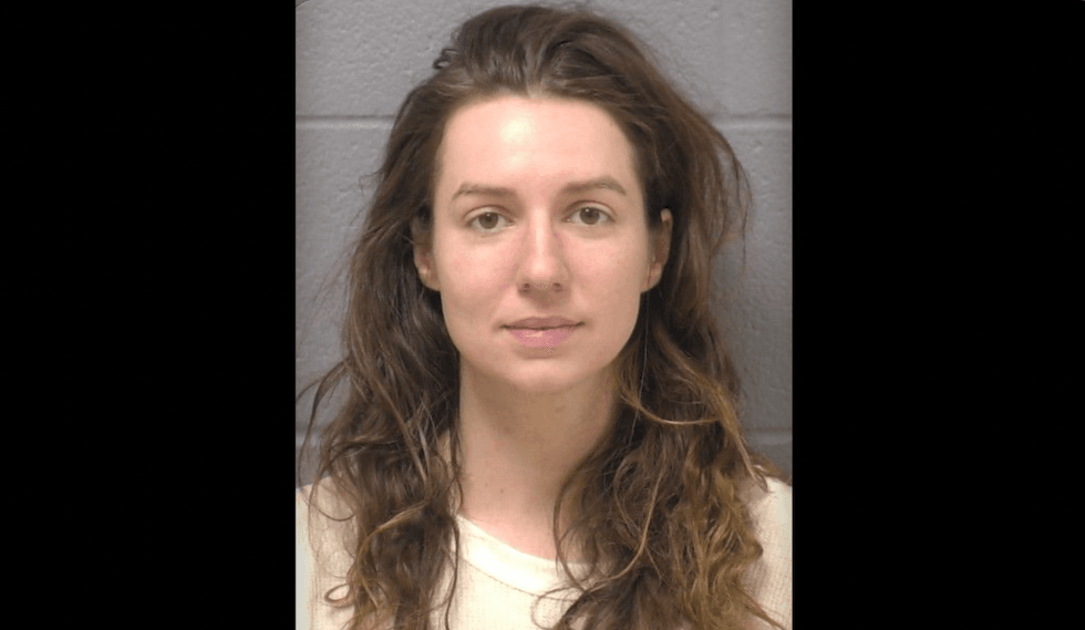 Woman accused of fatally shooting father of her 2 children amid surprise massage — and then turning gun on his parents