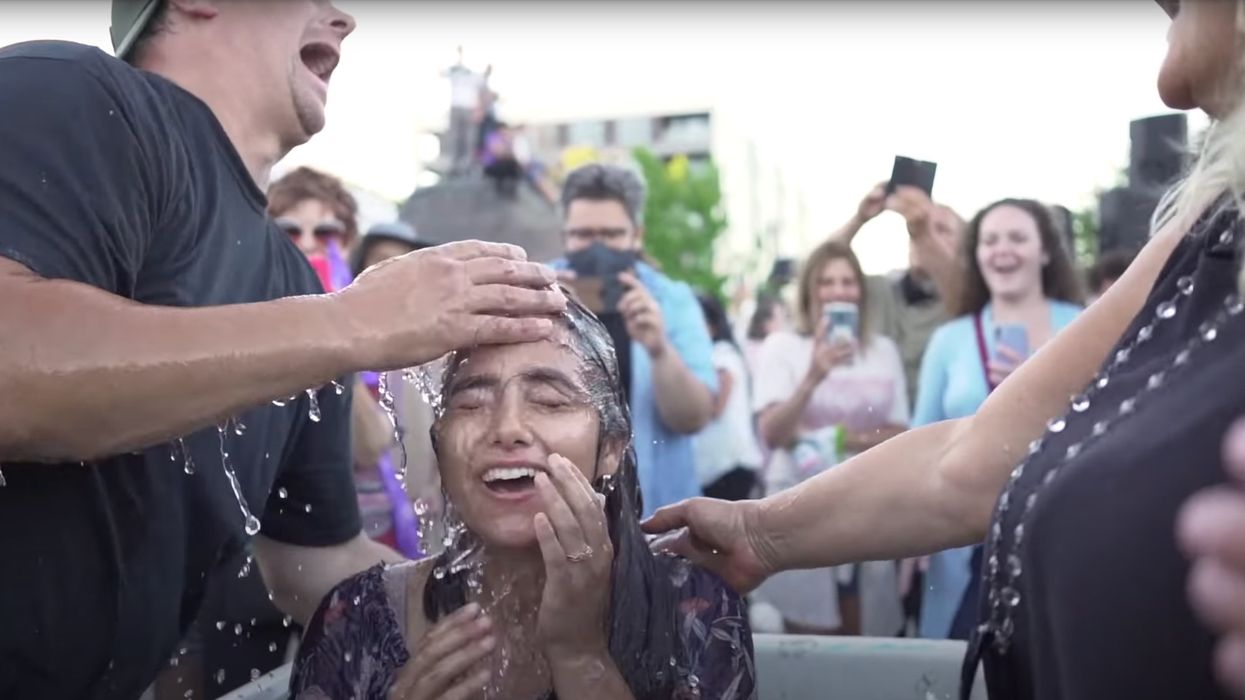 Woman being baptized