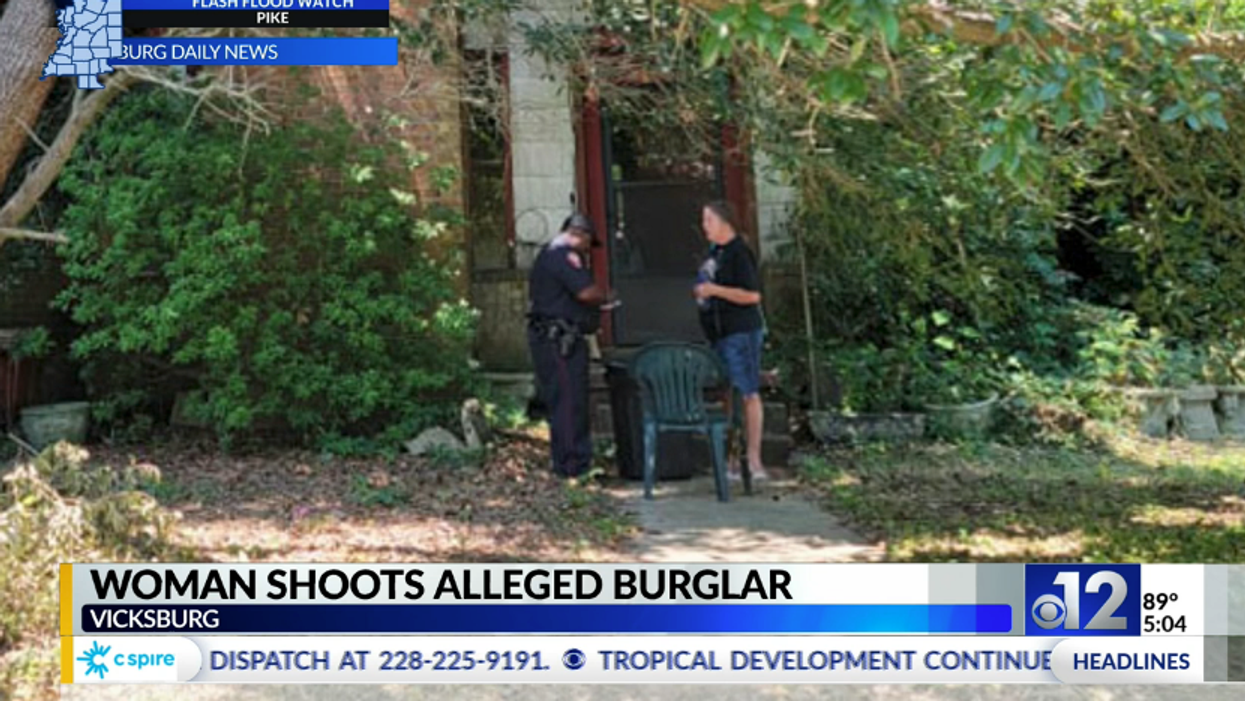 Woman catches burglar in her home, holds him at gunpoint while waiting for police. When he makes a threatening move, she opens fire.