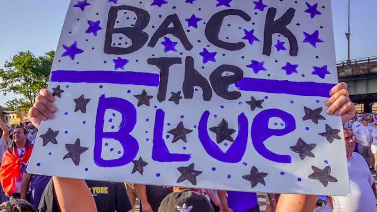 Woman charged with hate crime after stomping on Back the Blue sign, crumpling it, throwing it in trash — while 'smirking' at deputy in 'intimidating manner'