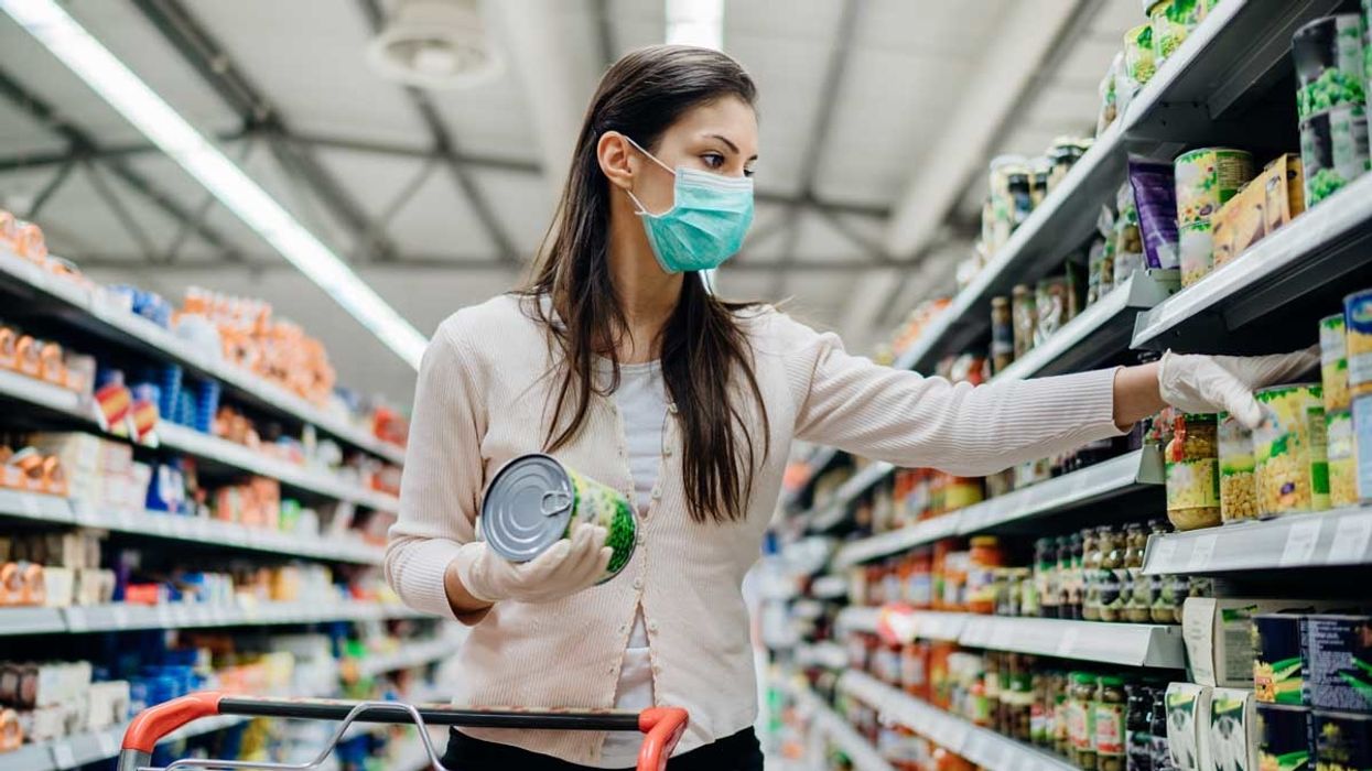 Woman in grocery store in mask