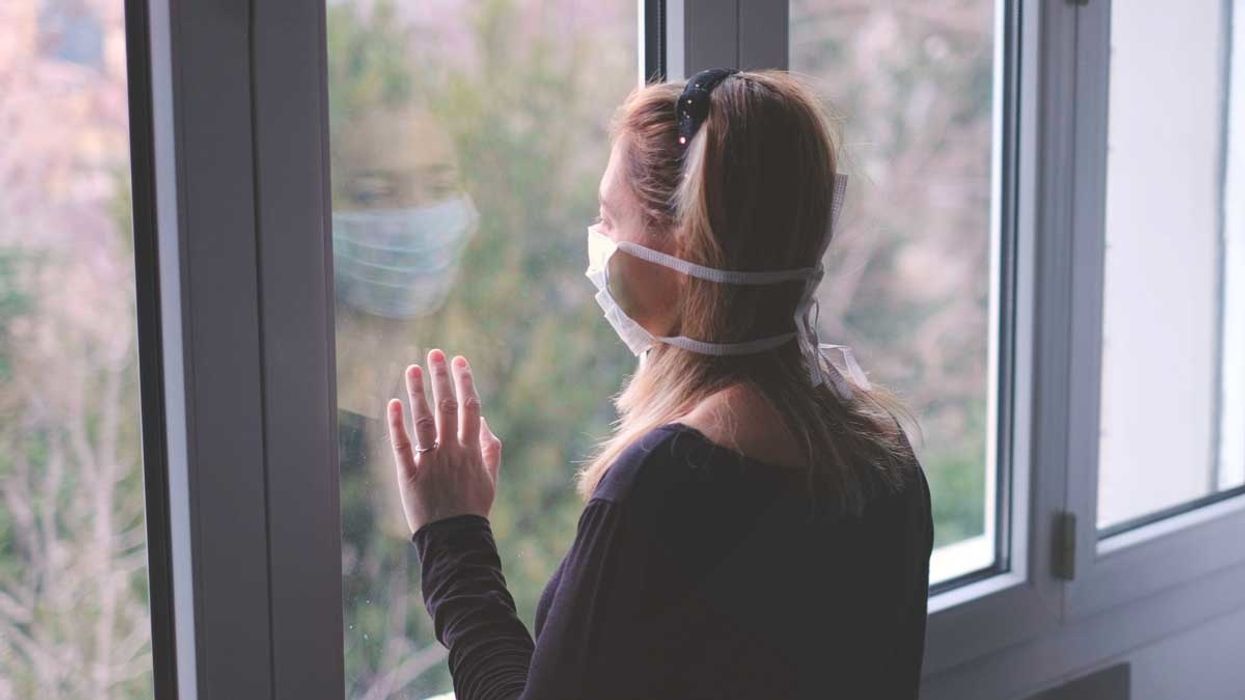 Woman in mask in lockdown