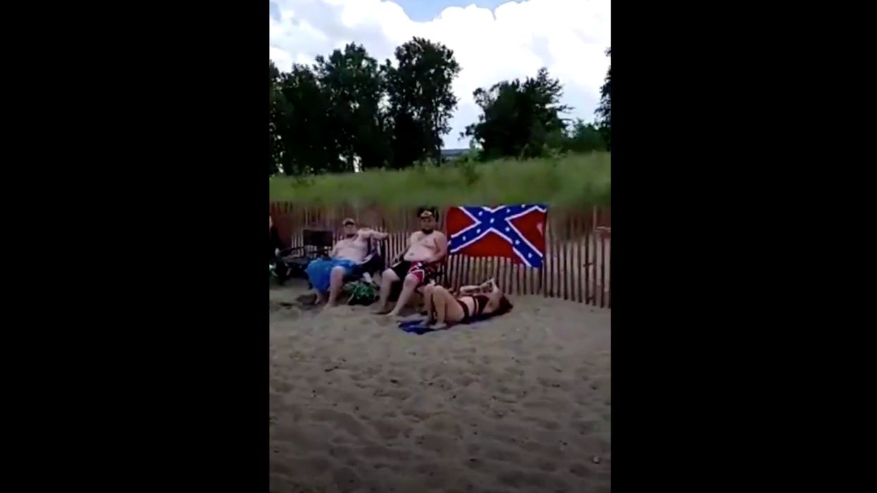 Woman publicly berates beachgoers for Confederate towel. A black vet intervenes, changes the narrative.