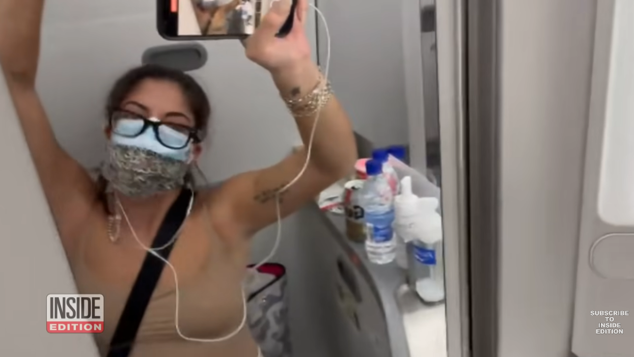 Woman self-isolates in airplane bathroom for 4 hours after testing positive mid-flight