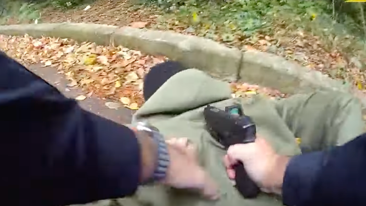 'You done f**ked up, son!' Cop rubs it in after capturing homicide suspect armed with handgun modified as fully automatic